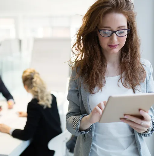 happy-employee-holding-a-tablet-aura